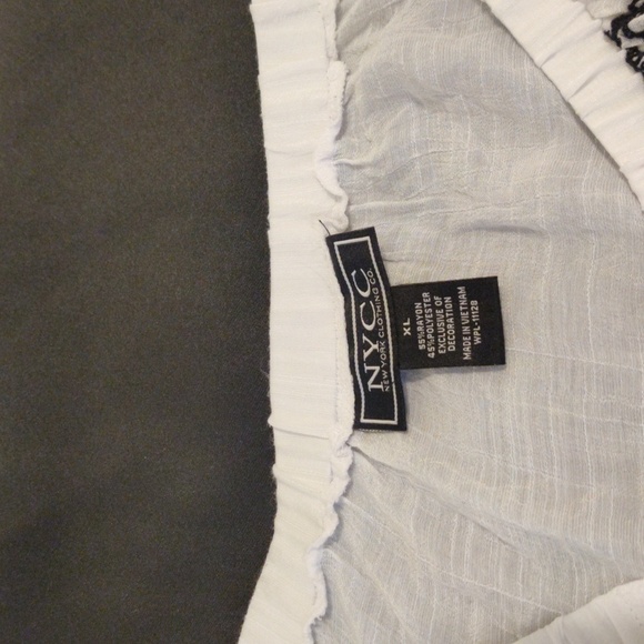 NYCC Semi-transparent white blouse with black embroidery on the front. - Picture 2 of 10